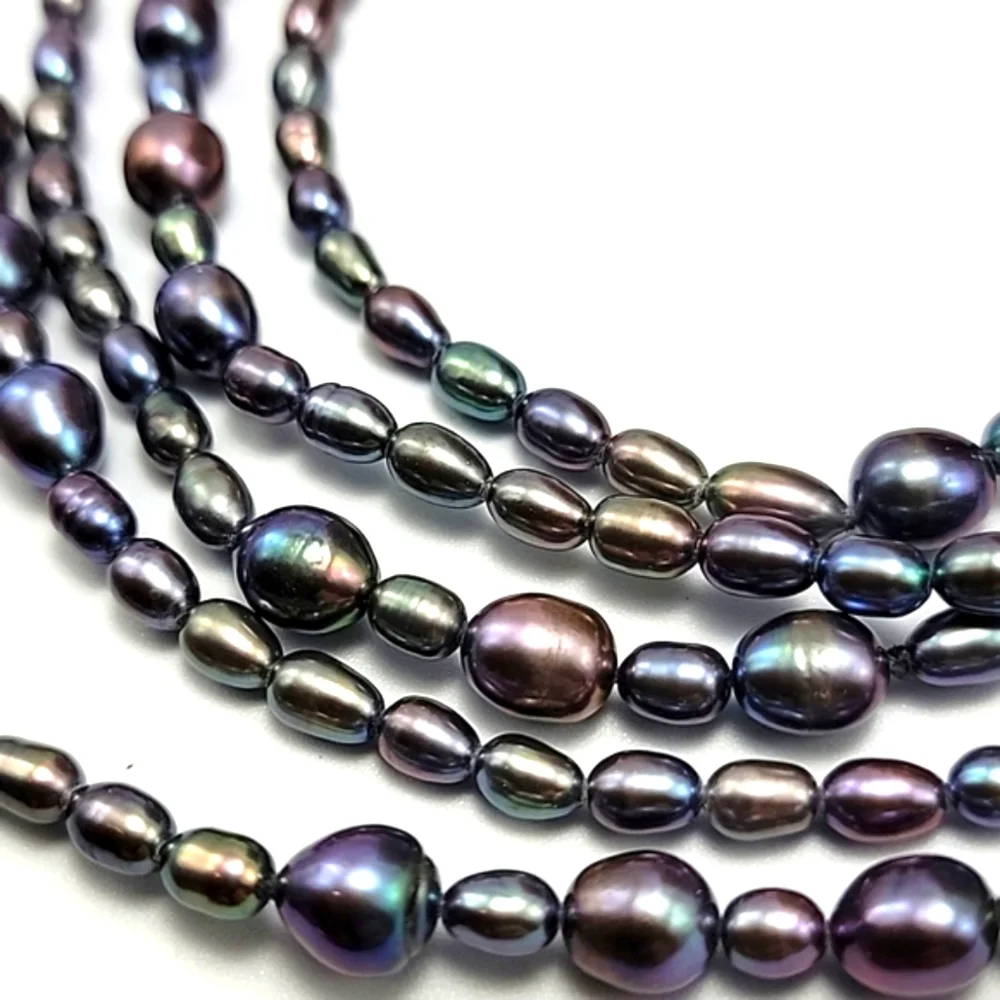 Lustrous Black Charcoal Fresh Water Peacock Pearl 66
